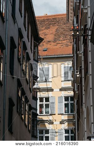 Graz, Austria - August 11, 2017: Low angle view of old buildings in historical city center of Graz