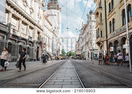 Graz, Austria - August 11, 2017: Low angle view of main street in historical city center of Graz.