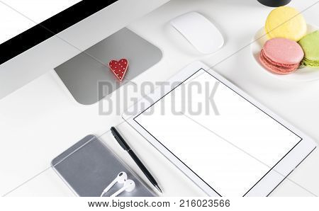 Tablet computer PC with blank screen mock up business office table. Tablet computer isolated white screen. Tablet white screen with copy space. Empty space for text.