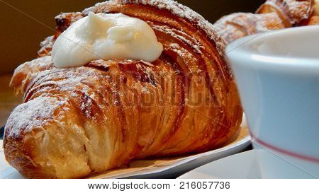 Typical sicilian breakfast in a bar. Ricotta brioches