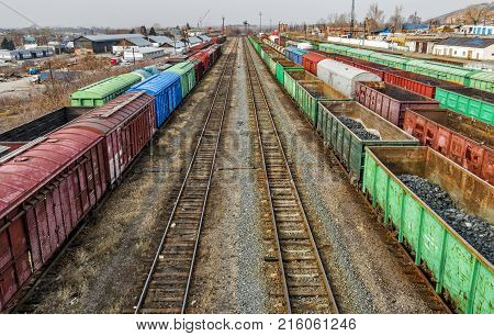 Freight wagons on railway station. Industrial district
