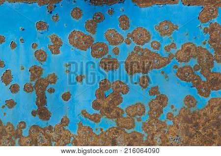 Background of rusty metal with irradiated paint