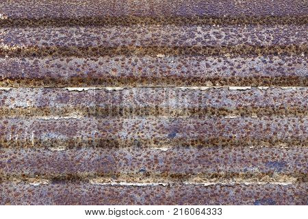 Background of rusty metal with irradiated paint