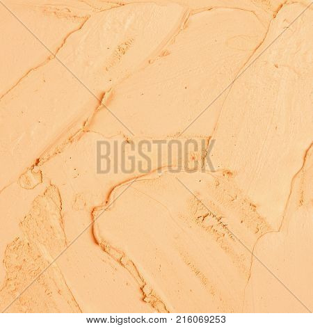 Close up cream foundation color sample background