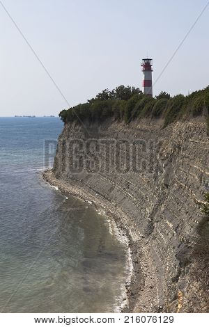 Lighthouse on a steep bank of Tolstoy Cape in Gelendzhik, Krasnodar region, Russia