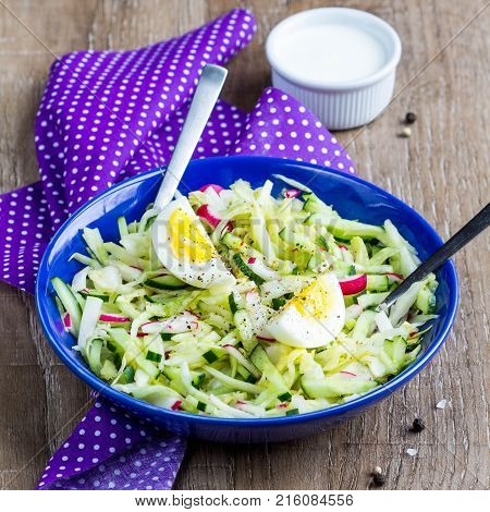 Fresh Salad With Cabbage, Cucumber, Radish And Egg, Healthy Spring Dish In Rustic Style And Bright P