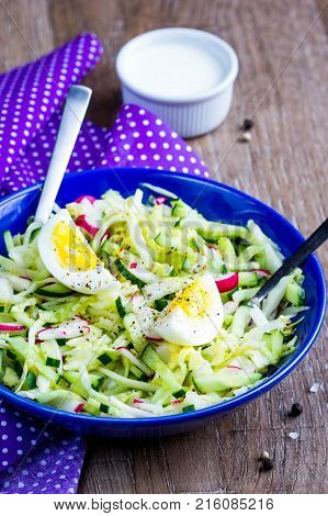 Fresh Salad With Cabbage, Cucumber, Radish And Egg, Healthy Spring Dish In Rustic Style And Bright P
