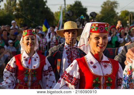 Unknown People Enjoy On The Beach Of Azov Sea