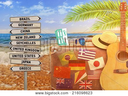 Concept of summer traveling with old suitcase and burning sun
