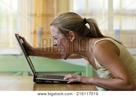 woman is angry about computer