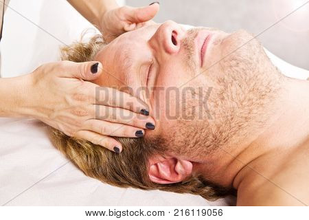 a Man getting massage in thebeauty center