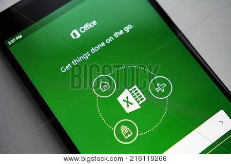 Berlin Germany - November 19 2017: Microsoft Exel application on screen modern smartphone. Microsoft office on mobile phone.