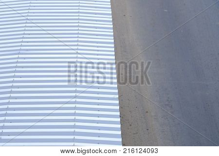 Top view roof surface of a bus station with blur street texture background