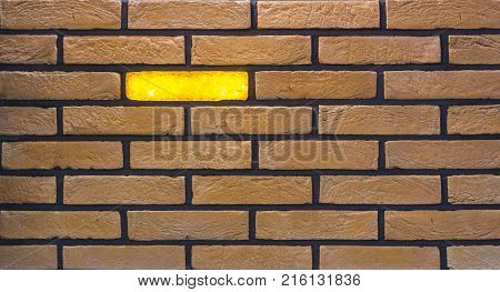 Decorative brick wall from concrete facing tiles as background or texture.