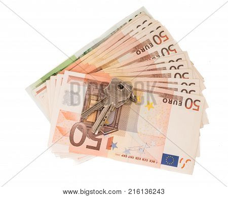 Background with euro money. Magnifier focused on keys. Euro banknotes. 50 euro.