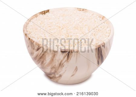 Rice croquet in a pial plate on a white background isolation