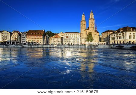 Zurich city center with famous Grossmunster and river Limmat, Switzerland