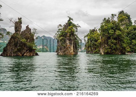 Island in the dam with tree from the boat view Southern of Thailand Surat Thani