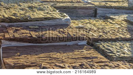 decorative building stone on a pallet can be used for advertising.