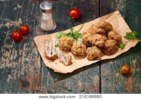 Vietnamese food. Delicious homemade fish balls on wooden table.