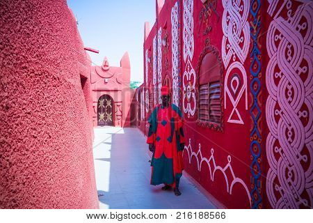 Exterior view to Damagaram sultan residence and portrait of sultans guard in national uniform 24 september 2017 Zinder Niger