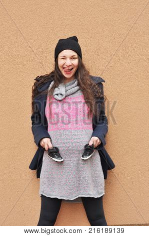 Pregnant woman. Pregnancy. A photo of a cute caucasian pregnant woman.