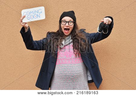 Pregnant woman. Pregnancy. A photo of a cute caucasian pregnant woman.