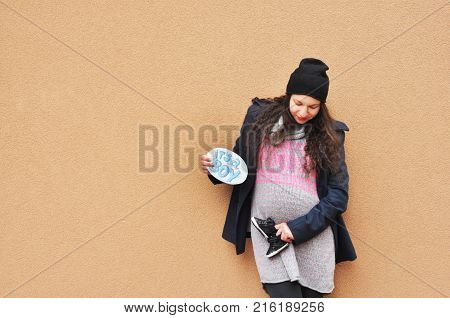 Pregnant woman. Pregnancy. A photo of a cute caucasian pregnant woman.