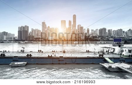 andscape of downtown near water of chongqing in blue sky
