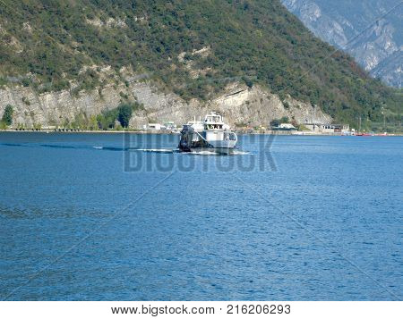 A ferry sailing towards Monteisola on Lake Iseo - Brescia