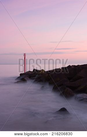 Sunset in West Bay Dorset England. The area is part of the Jurassic Coast a World Heritage Site.