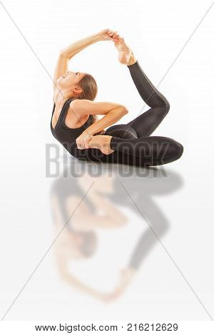 Beautiful Flexible Woman Doing Yoga Poses On White