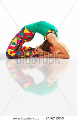 Beautiful Flexible Woman Doing Yoga Poses On White