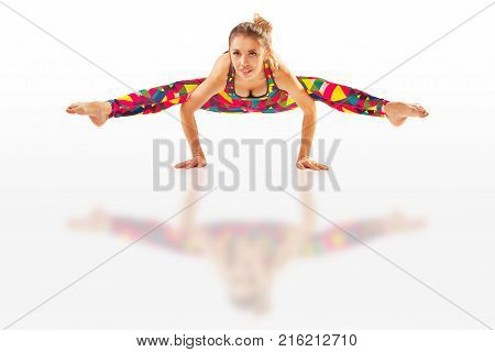 Beautiful Flexible Woman Doing Yoga Poses On White