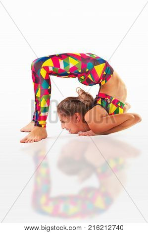 Beautiful Flexible Woman Doing Yoga Poses On White