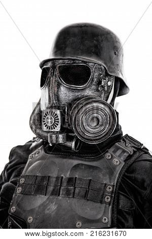 Futuristic nazi soldier gas mask and steel helmet with schmeisser handgun isolated on white studio shot closeup portrait