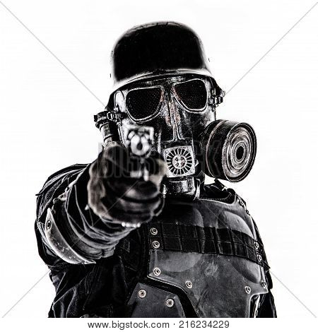 Futuristic nazi soldier gas mask and steel helmet with luger pistol handgun isolated on white studio shot