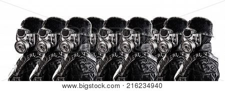 Line of futuristic nazi soldier gas mask and steel helmet isolated on white studio shot closeup portrait