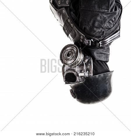 Futuristic nazi soldier gas mask and steel helmet with schmeisser handgun isolated on white studio shot closeup portrait upside down