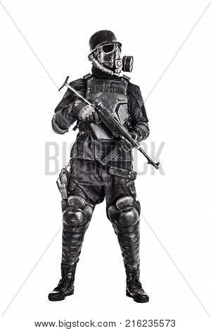Futuristic nazi soldier gas mask and steel helmet with schmeisser handgun isolated on white studio shot full body portrait