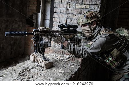 Marksman in action in the ruined city