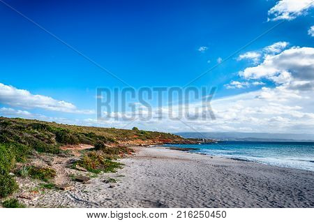Beach In A Sunny And Cloudy Day