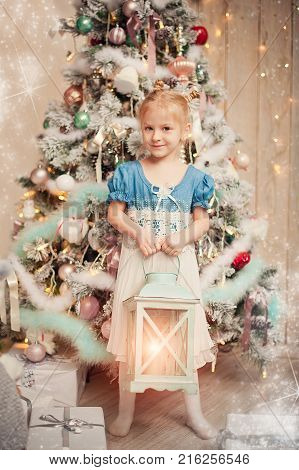 little girl having fun in christmas room