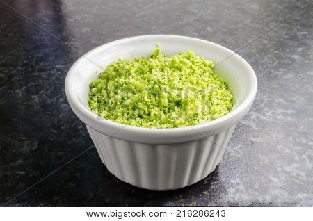 Riced Broccoli in a White Bowl Studio Photograph