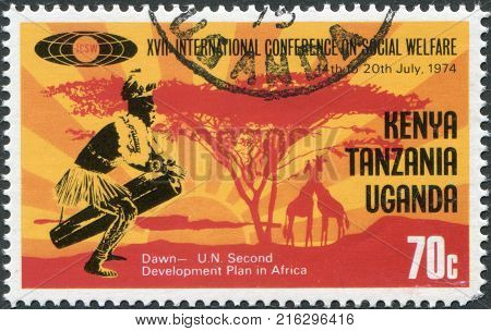 EAST AFRICAN COMMUNITY - CIRCA 1974: A stamp printed in East African Community, dedicated to the International Conference on Social Welfare, shows a drummer and a sunset, circa 1974