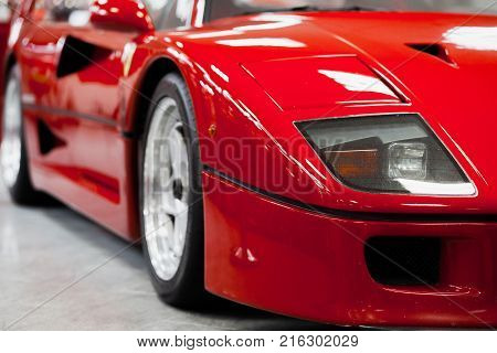 Car's bold front face. Red Sportcar. Cool