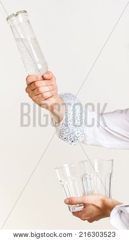 Bartender Fills Glass From Bottle.
