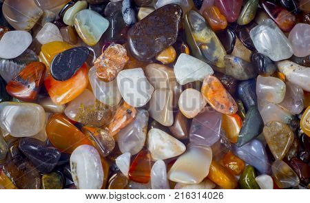 natural background - pile of semi precious jewelery stones closeup. best for craftsmanship, interior design, gift