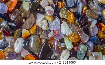 natural background - pile of semi precious jewelery stones closeup. best for craftsmanship, interior design, gift