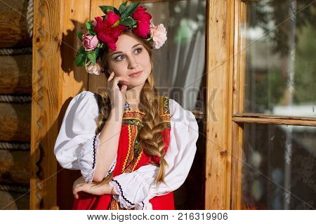 Russia Moscow Izmaylovsky Park August 27 2017. International Photo Festival.Beautiful woman portrait in russian style. Beautiful Russian girl in traditional dress. Russian style.